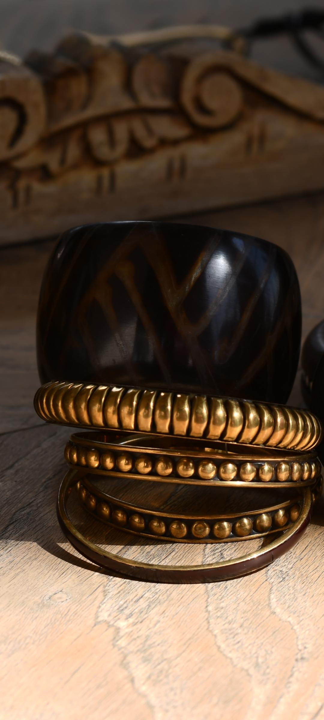 set of six wooden and metals bracelet